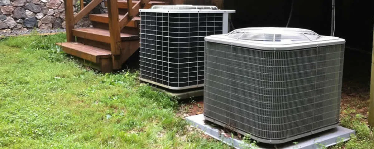 Heat pump installation and service units outside a home in Allen, TX